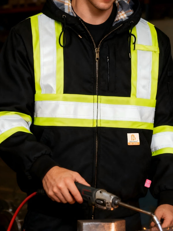 Worker wearing a hi-vis FR winter jacket