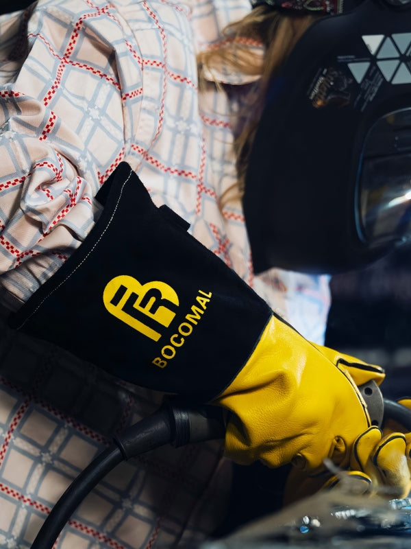 Welder wearing FR protective clothing
