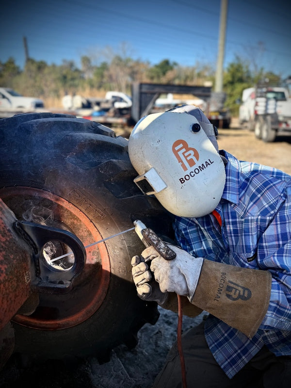 Welder wearing Bocomal FR protective gear